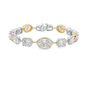 Elevate your wrist with this exquisite two-tone tennis bracelet. Meticulously crafted in radiant yellow gold, this elegant bracelet showcases brilliant-cut colorless diamonds in square and oval shapes. A timeless fusion of classic design and unparalleled sparkle, it embodies enduring sophistication. This alluring diamond bracelet is the ultimate treasure.