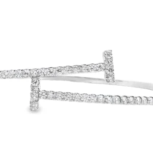 Elevate your style with this exquisite flexible bangle bracelet crafted from lustrous 14kt white gold-finish. Features a captivating design adorned with meticulously cut round brilliant diamonds, radiating unparalleled sparkle and sophistication. These bangles are a perfect fusion of modern artistry and timeless elegance. Diamond weight-2.00ct.