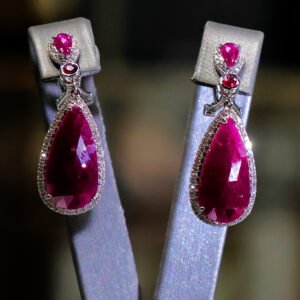 14 kt White Gold Dangle Earrings with Purple Ruby Cabochons. SKU DDI-590-10007