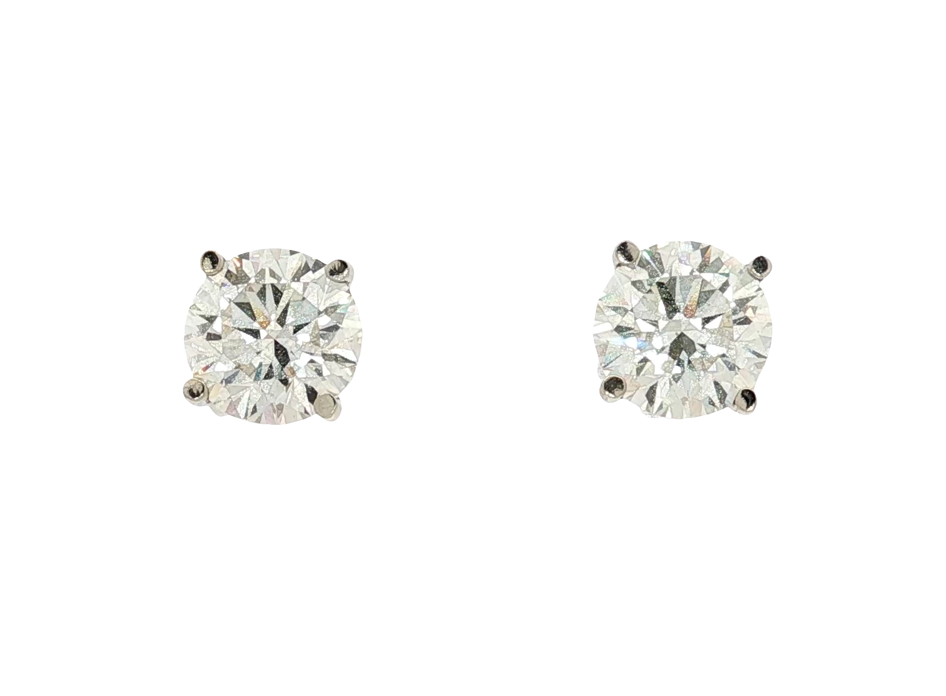 matching 1.6 each K VS Brilliants set in Classic White Gold Stud Earrings. SKU 2474