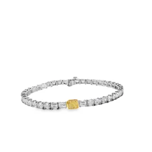 18K White Gold Tennis Bracelet with 0.790Fancy Yellow Radiant Cut Diamond and 41 emeralds. SKU 2676